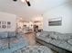 Open-concept living room showcasing a kitchen, dining area, and plush seating at 142 Richmond Way, Villa Rica, GA 30180