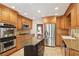 Spacious kitchen showcases modern stainless steel appliances, granite countertops, and tile flooring at 1566 Arden Sw Dr, Marietta, GA 30008