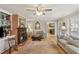 Bright living room featuring a fireplace, hardwood floors, and neutral furniture at 1566 Arden Sw Dr, Marietta, GA 30008