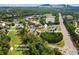 Scenic aerial shot highlighting Kennesaw Mountain, Marietta CC golf course, and Mount Paran School location at 2121 Whitekirk Nw St, Kennesaw, GA 30152