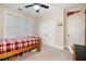 Bedroom featuring carpet floors, a window, closet and a bed at 2121 Whitekirk Nw St, Kennesaw, GA 30152