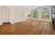 Bright living room with views from large arched windows and access to an adjacent living space at 2121 Whitekirk Nw St, Kennesaw, GA 30152
