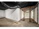 Unfinished basement area with exposed pipes, support beams, and block wall construction at 3069 Thrasher Cir, Decatur, GA 30032