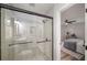 New bathroom features a tiled walk in shower with a glass door and modern fixtures at 3069 Thrasher Cir, Decatur, GA 30032