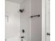 Bathroom featuring white subway tiles, black hardware and fixtures, and a shower at 3069 Thrasher Cir, Decatur, GA 30032
