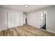 Large bedroom features wood flooring, neutral walls, closet and doors leading to other rooms at 3069 Thrasher Cir, Decatur, GA 30032