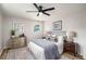 Bedroom with hardwood floors, modern fan, and windows providing natural light at 3069 Thrasher Cir, Decatur, GA 30032
