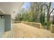 Wide wooden deck with railing offering outdoor living space, perfect for entertaining and relaxing at 3069 Thrasher Cir, Decatur, GA 30032