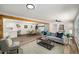 Open-concept design showcasing the living, dining, and kitchen areas with hardwood floors at 3069 Thrasher Cir, Decatur, GA 30032