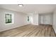 Living room features hardwood floors and natural light from several windows at 3069 Thrasher Cir, Decatur, GA 30032