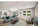Inviting living room with natural light, stylish decor, and hardwood floors at 3069 Thrasher Cir, Decatur, GA 30032