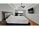 Main bedroom with wood floors and a ceiling fan at 7037 Waters Edge Dr, Stone Mountain, GA 30087