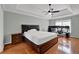 Main bedroom with wood floors and a ceiling fan at 7037 Waters Edge Dr, Stone Mountain, GA 30087