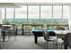 Bright game room featuring a pool table, lounge seating, and large windows with scenic views at 855 Peachtree Ne St # 2403, Atlanta, GA 30308