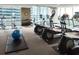 Well-equipped gym with modern exercise equipment and large windows, providing a fitness-focused environment at 855 Peachtree Ne St # 2403, Atlanta, GA 30308