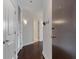 Inviting hallway features sleek dark wood floors and modern lighting fixtures at 855 Peachtree Ne St # 2403, Atlanta, GA 30308