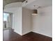 Cozy living space with hardwood floors and natural light from the balcony doors at 855 Peachtree Ne St # 2403, Atlanta, GA 30308