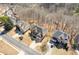 Beautiful aerial view of homes with mature trees and landscaping at 3967 Bellingrath Main Nw, Kennesaw, GA 30144