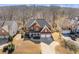 Aerial shot of a brick house with a spacious front lawn at 3967 Bellingrath Main Nw, Kennesaw, GA 30144