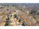 Gorgeous aerial view of a residential neighborhood surrounded by lush trees at 3967 Bellingrath Main Nw, Kennesaw, GA 30144