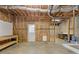 Unfinished basement with work bench, framing, utilities, and concrete floors at 3967 Bellingrath Main Nw, Kennesaw, GA 30144