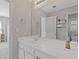 Bright bathroom has a white vanity with a large mirror and ample counter space at 3967 Bellingrath Main Nw, Kennesaw, GA 30144