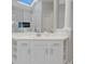 Modern bathroom vanity with white cabinets, countertop, and stylish fixtures at 3967 Bellingrath Main Nw, Kennesaw, GA 30144