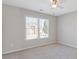 Cozy bedroom with a window and neutral decor at 3967 Bellingrath Main Nw, Kennesaw, GA 30144