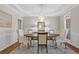 Sophisticated dining room with modern chandelier and elegant furnishings at 3967 Bellingrath Main Nw, Kennesaw, GA 30144