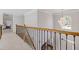 Bright hallway features modern chandelier, arched window, and wrought iron railing at 3967 Bellingrath Main Nw, Kennesaw, GA 30144