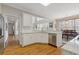 Open-concept kitchen with stainless steel dishwasher, granite countertops and eat-in dining area at 3967 Bellingrath Main Nw, Kennesaw, GA 30144