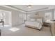 Spacious main bedroom with tray ceilings, walk-out to balcony, and ensuite bath at 3967 Bellingrath Main Nw, Kennesaw, GA 30144