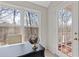 Bright office space featuring a large window and exterior door leading to an outdoor patio at 3967 Bellingrath Main Nw, Kennesaw, GA 30144