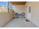 Covered patio with table, chairs and outdoor access at 3967 Bellingrath Main Nw, Kennesaw, GA 30144