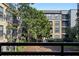 Enjoy relaxing balcony views overlooking lush greenery and building exterior at 400 17Th Nw St # 2218, Atlanta, GA 30363