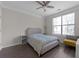 Bedroom features a bed, desk, a large window, and plenty of natural light at 400 17Th Nw St # 2218, Atlanta, GA 30363