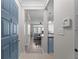 Inviting entryway featuring neutral tones, leading to a living area with hardwood flooring at 400 17Th Nw St # 2218, Atlanta, GA 30363