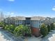 Exterior view of community with trees and professional landscaping at 400 17Th Nw St # 2218, Atlanta, GA 30363