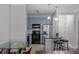 Bright kitchen featuring stainless steel appliances, blue cabinets, and a convenient breakfast bar at 400 17Th Nw St # 2218, Atlanta, GA 30363