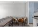 Stylish open-concept kitchen featuring sleek countertops and blue cabinets next to the living room at 400 17Th Nw St # 2218, Atlanta, GA 30363