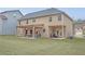 Backyard featuring a covered patio, offering an inviting outdoor living space at 4349 Sublime Trl, Atlanta, GA 30349