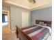 Well-lit bedroom with neutral paint and carpet, plus large window at 4349 Sublime Trl, Atlanta, GA 30349
