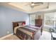 Cozy bedroom with neutral walls and carpet and plenty of natural light at 4349 Sublime Trl, Atlanta, GA 30349