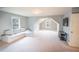 Large bonus room with neutral walls and carpet with recessed dormer windows at 4349 Sublime Trl, Atlanta, GA 30349