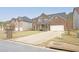 Appealing two-story brick home with landscaped front yard and a two-car garage at 4349 Sublime Trl, Atlanta, GA 30349