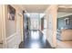 Welcoming foyer with hardwood floors, a high ceiling, and decorative barn doors for added character at 4349 Sublime Trl, Atlanta, GA 30349
