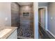 Tiled walk-in shower and updated sink in this modern bathroom at 6727 Kull Dr, Lithia Springs, GA 30122