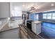Modern kitchen with stainless steel appliances, granite countertops, and hardwood floors at 6727 Kull Dr, Lithia Springs, GA 30122