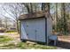 Exterior shot of an outbuilding in the backyard providing additional storage space at 6727 Kull Dr, Lithia Springs, GA 30122