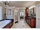 Bright and modern main bathroom featuring a soaking tub and glass-enclosed shower at 803 Amerden Ponds Ct, Johns Creek, GA 30097